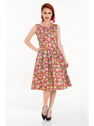 red background Venus Fly Trap print dress sleeveless fitted high neckline princess seamed bodice, wide banded waist, full gathered just below the knee length skirt, shown on model