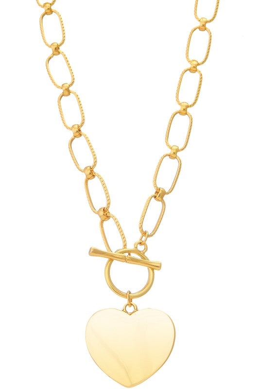 1 1/2" shiny gold metal heart pendant on big textured link 17" chain necklace with front toggle closure