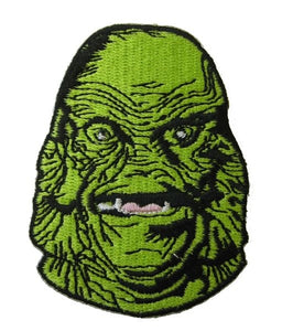 2.75" green and black embroidered patch depicting the face of the Creature From The Black Lagoon from the classic 1954 movie