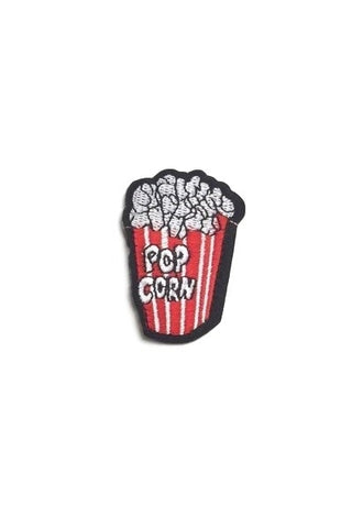 overflowing striped popcorn container 1 1/2" embroidered patch in red, white, and black