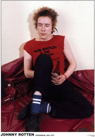 24" x 36" color photograph poster of Johnny Rotten seated on floor with beer bottle in Stockholm, 1977