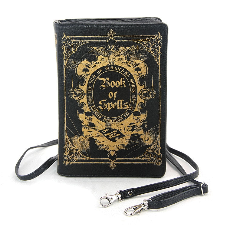 textured black faux leather with metallic gold print book-shaped "Book of Spells" clutch purse with detachable wristlet and crossbody straps