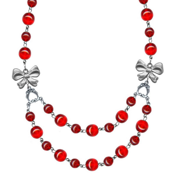 linked translucent round red beads 17" chain necklace with double strand center section anchored by silver metal bows, shown close-up