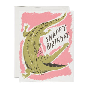 4.25" x 5.5" card "Snappy Birthday" black text green alligator pink party hat pink white background illustrated image