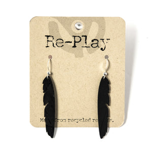 opposing pair 2" black feather earrings made from laser cut recycled vinyl records
