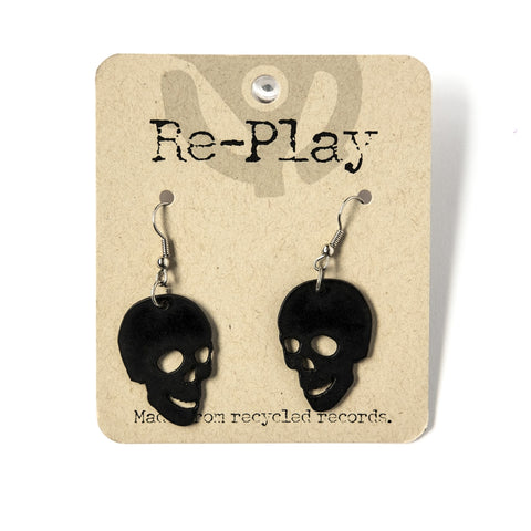 opposing pair 1 1/4" black skull earrings made from laser cut recycled vinyl records