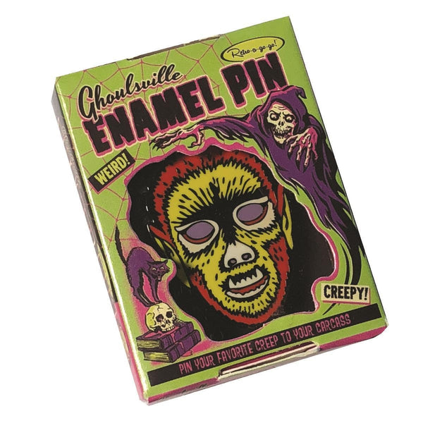 retro Halloween style "Electric Wolfman" mask 1" x 1 1/4" enameled metal clutch back pin, shown in illustrated box packaging