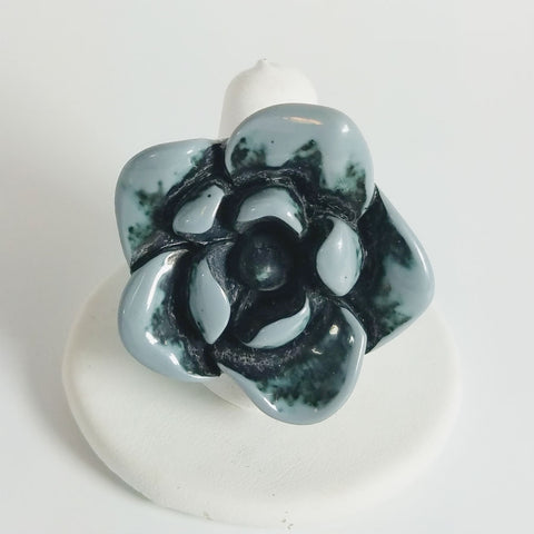 1.5" grey flower plastic ring with rich black shadowing