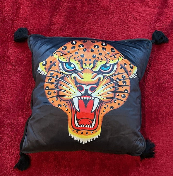 Jaguar artwork by Feda Sharp on printed black velvet 16" square pillow finished with black piping and tassels
