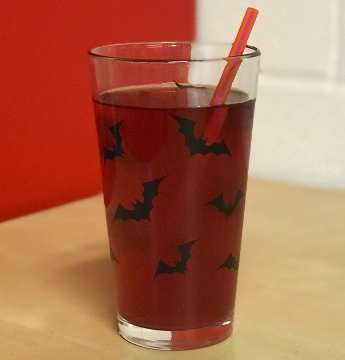 "Luna Bats" allover print in black on a sturdy pint glass