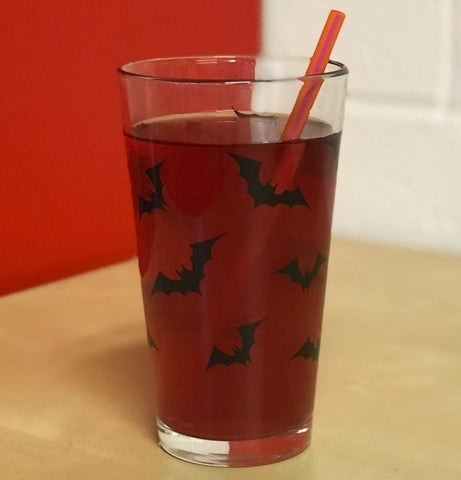 "Luna Bats" allover print in black on a sturdy pint glass