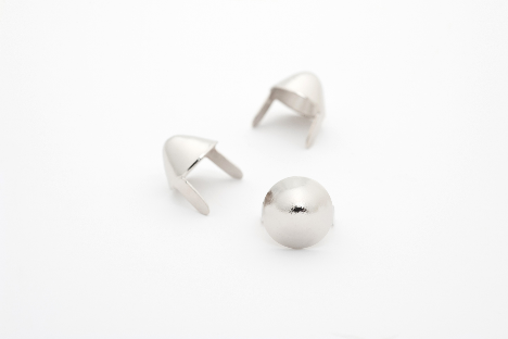 three English 77 style 5/6" (8mm) x 7/16" (11mm) silver metal cone studs, shown at different angles