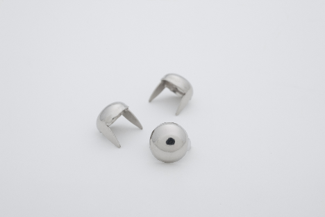 three 3/8" (9.5mm) silver metal dome studs, shown at different angles