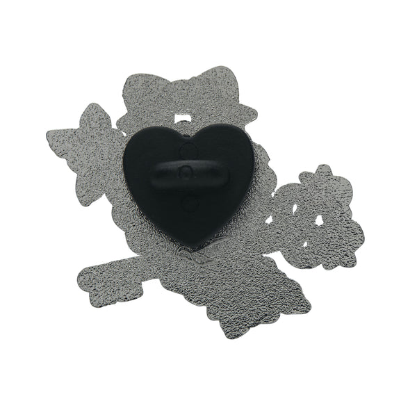 Cute & Spooky by Mimsy Gleeson collaboration collection "Lock and Key" enameled silver metal clutch back pin. The silver back of the pin with rubber heart shaped backing