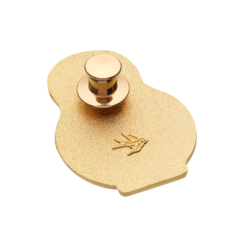 An enamel pin with a gold metal locking pin back 