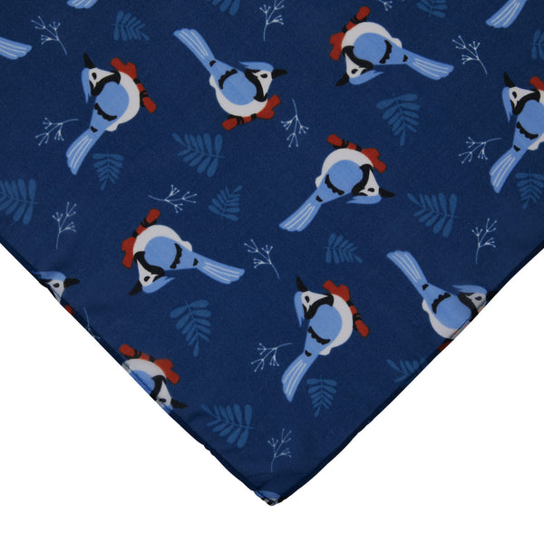 27" x 27" deep blue semi-sheer Blue Jay Wayn blue birds allover print scarf, showing corner swatch close up