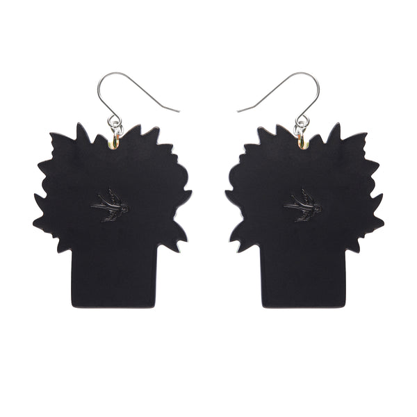 pair Terry Runyan Collaboration Collection "Catmen Miranda" layered resin black cat in a fruity turban dangle earrings, showing solid black back view