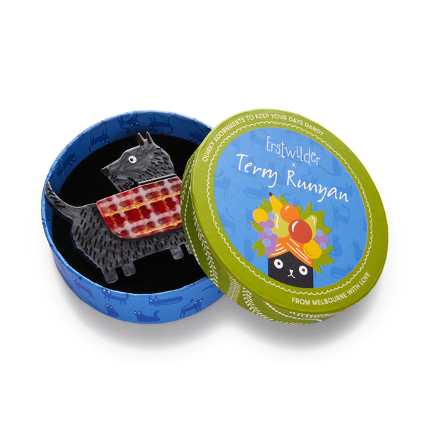 Terry Runyan Collaboration Collection "Scottie Love" layered resin dog in a plaid coat brooch, shown in illustrated round box packaging