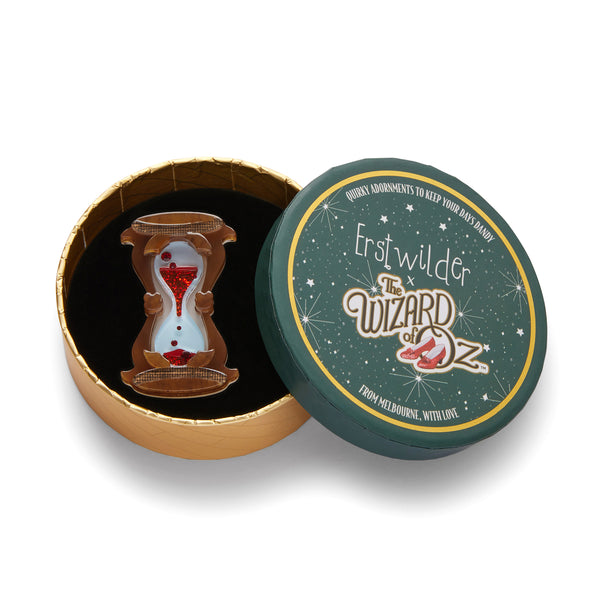Wizard of Oz Collection "Hourglass" layered resin brooch with Czech glass crystals, shown in illustrated round box packaging
