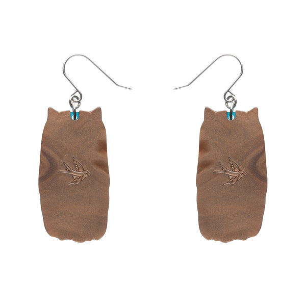 pair Terry Runyan Collaboration Collection "Feather Dress" layered resin blie and brown owl dangle earrings, showing back view
