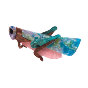La Belle Époque Collection "Rite of Spring" layered resin blue, green, pink, and brown grasshopper brooch