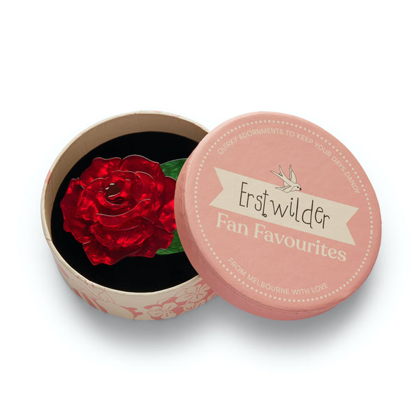 Fan Favourites release "Juliet's Bloom" red rose blossom with two green leaves layered resin brooch, shown in illustrated round box packaging