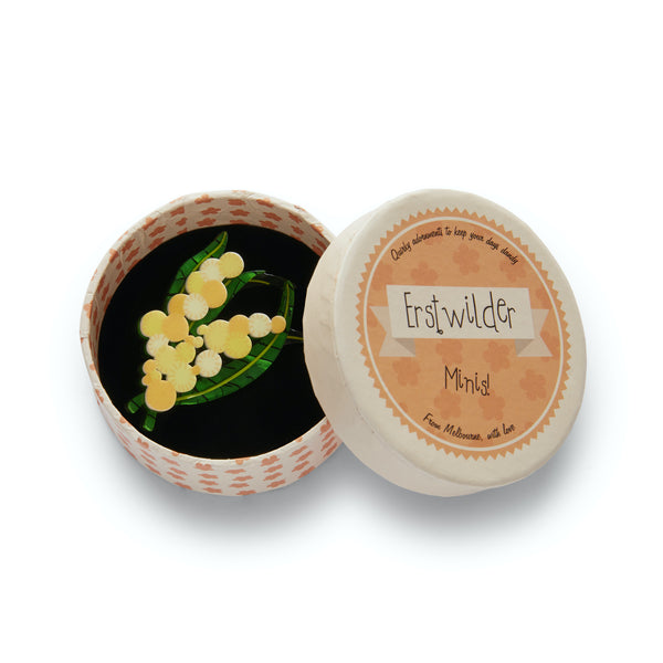 "Woven Wattle" yellow & white acacia blooms and green leaves layered resin mini brooch, shown in illustrated round box packaging