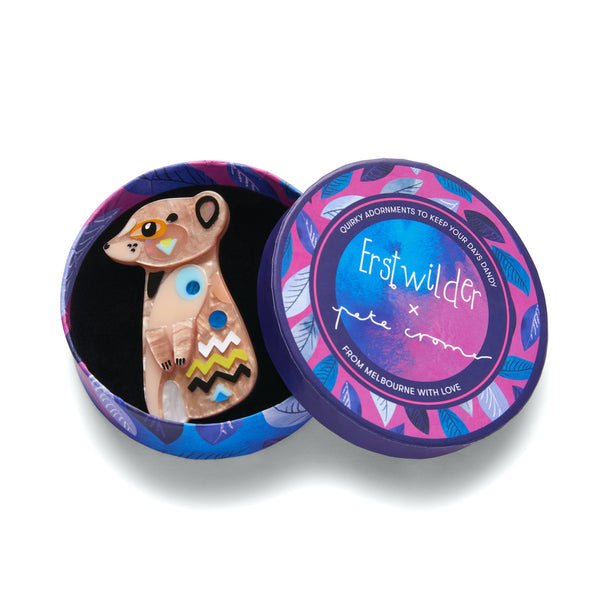 Pete Cromer x Erstwilder Wildlife Collaboration Collection "The Masterful Meerkat" layered resin brooch, shown in illustrated round box packaging