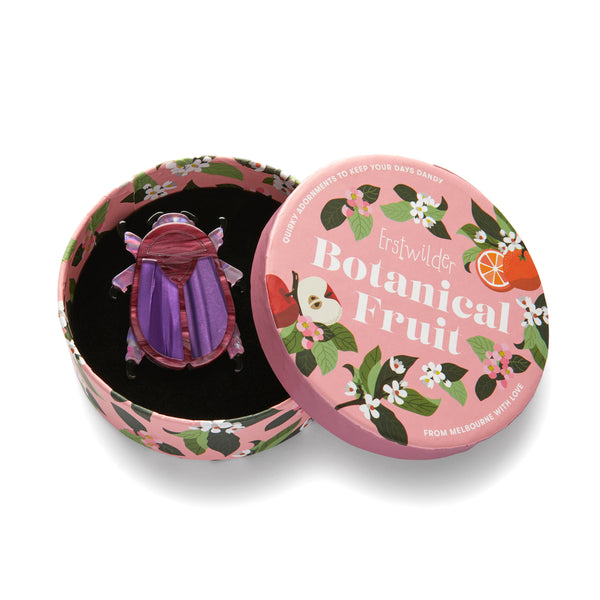 Botanical Fruit Collection "Summer Scarab" purple layered resin beetle brooch, shown in illustrated round box packaging