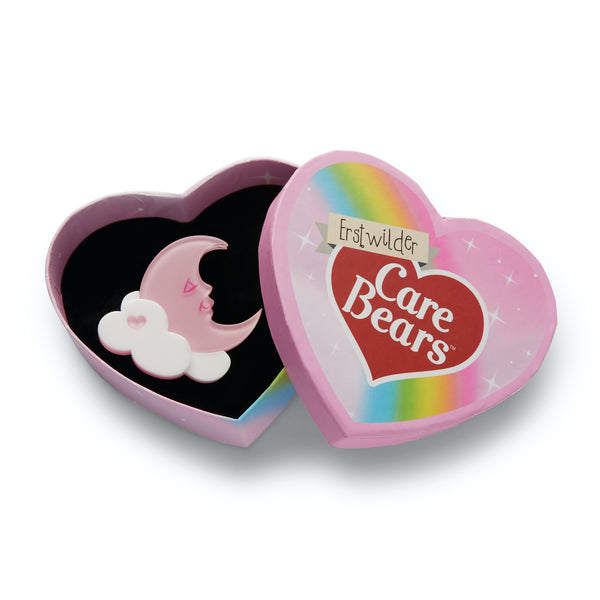 Care Bears Collection "Sweetest Dreams" pink cresecent moon on cloud layered resin brooch, shown in illustrated heart-shaped box packaging