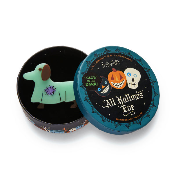 All Hallows' Eve collection "A Most Ghostly Pooch" glow-in-the-dark costumed dog layered resin brooch, shown in illustrated round box packaging