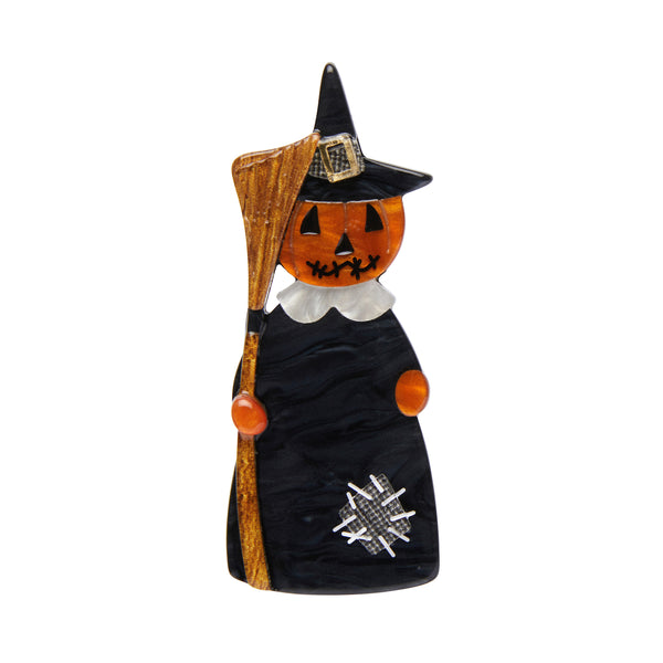 All Hallows' Eve collection "The Stitched Witch" black and orange pumpkin-headed witch holding broom layered resin brooch